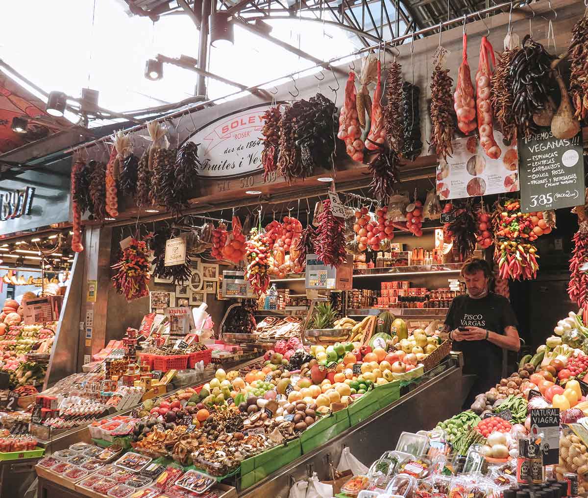 26 Most Instagrammable Places in Barcelona 6 Fruit and vegetable stand at Boqueria Market in Barcelona, Spain.
