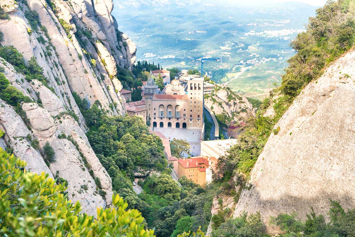 a view of the mountains and town in Montserrat Barcelona