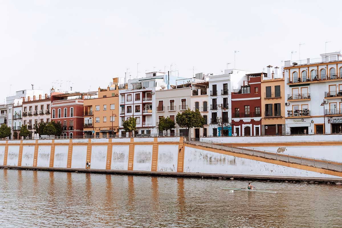 Colourful buildings overlooking the Guadalquivir River, in Triana Seville