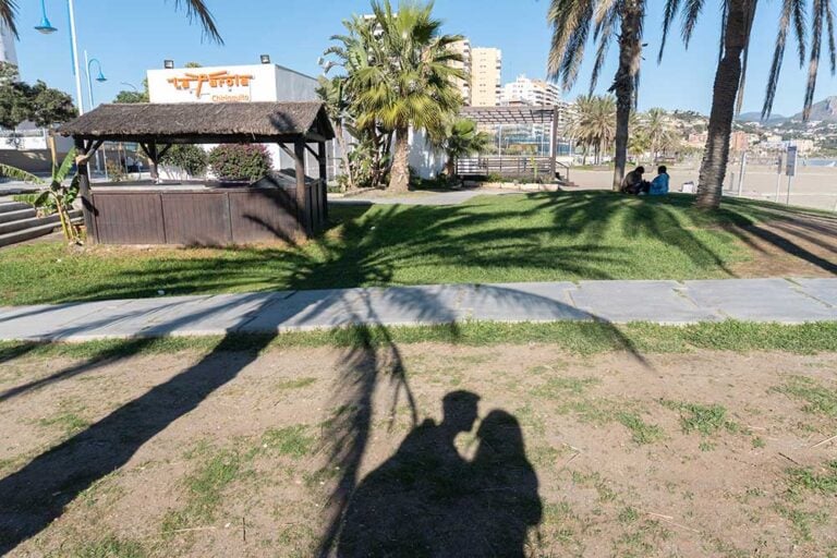 a shadow of a couple in la malagueta beach