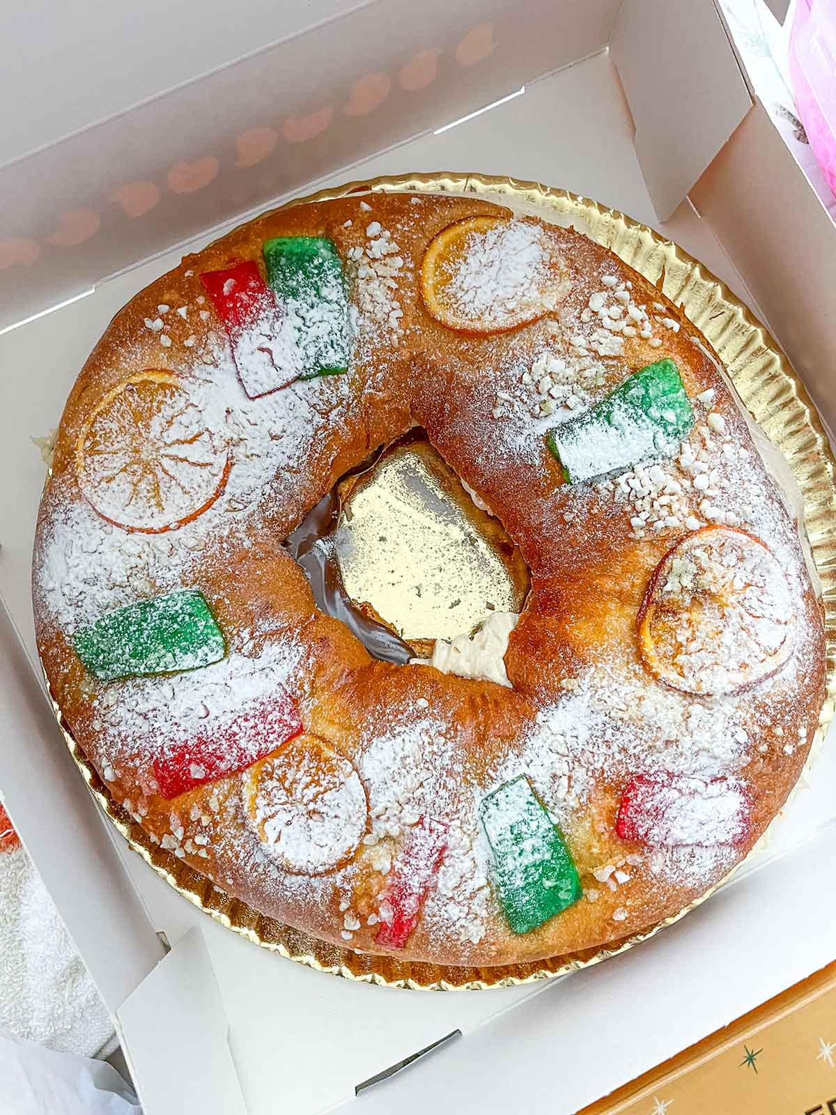 A close up photo of a roscon de reyes, the famous three kings cake.