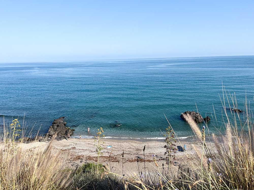 Is Benalmadena Safe? Tips From a Local 3 Arroyo Hondo Beach on a sunny day.