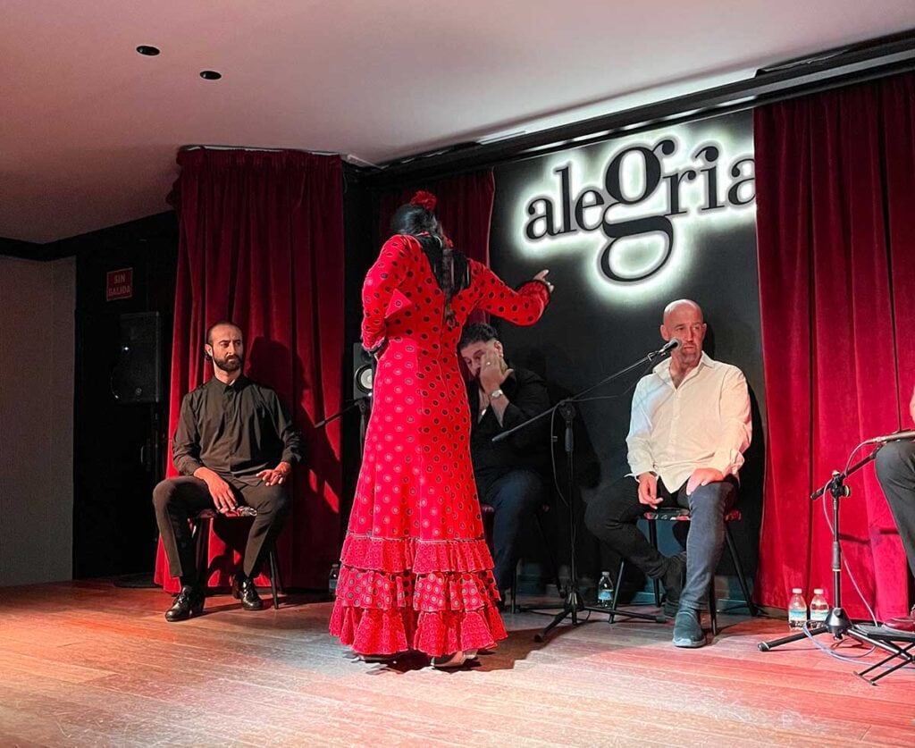 17 Incredible Reasons to Visit Andalucia 2 Woman dancing flamenco in Alegria, Malaga, Spain.