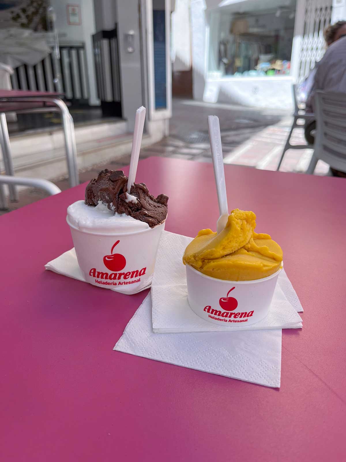 Two ice cream tubs from Amarena ice cream shop in Almuñecar, Granada.