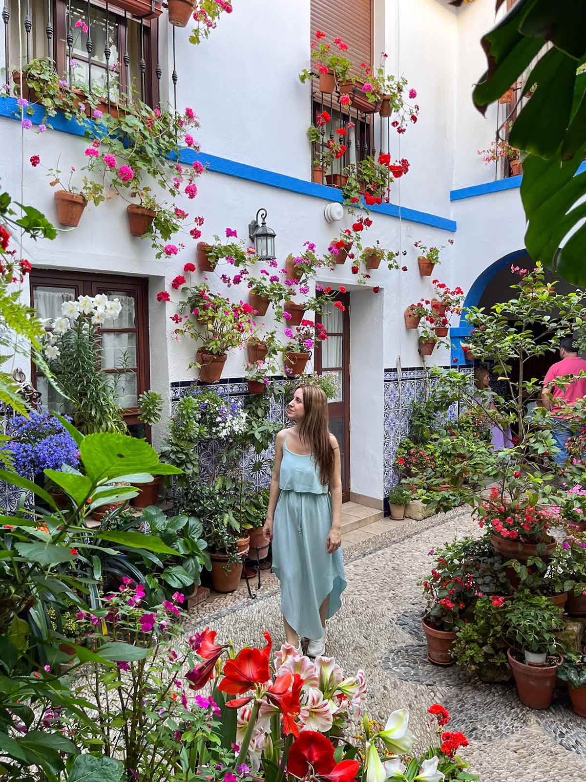 Cristina in a patio at the Cordoba Courtyard Festival.