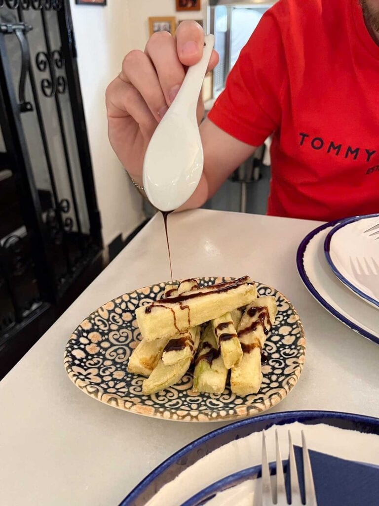 Marbella Old Town: Unmissable Spots By a Local 14 Fried aubergine with sugar cane honey at Taberna la Niña del Pisto.