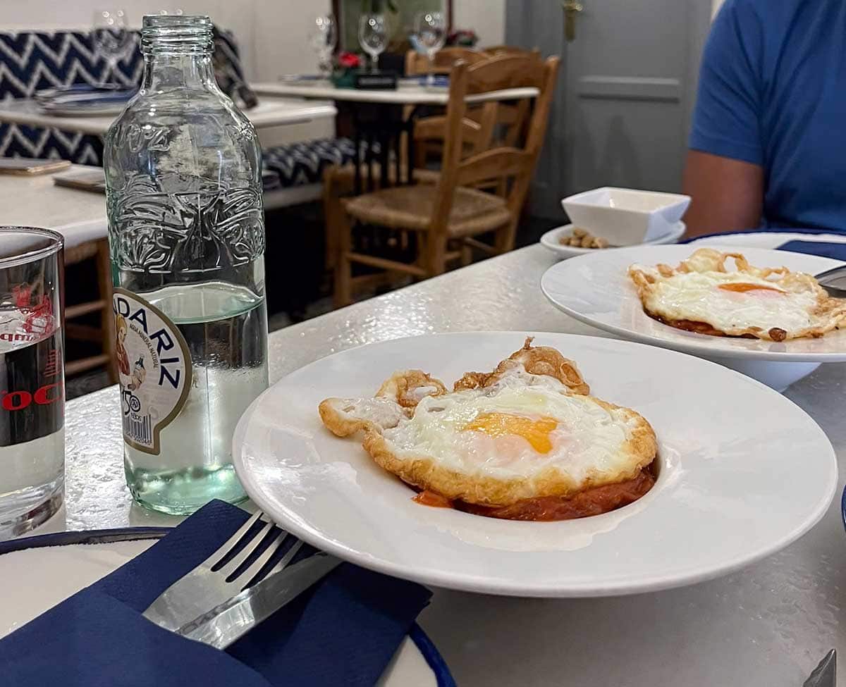 Pisto with a fried egg on top at Taberna la Niña del Pisto.