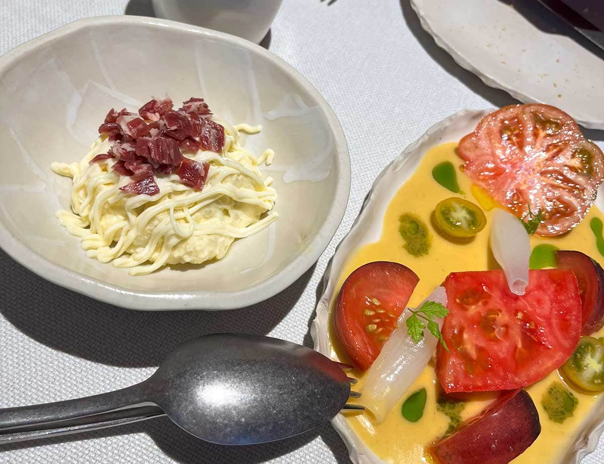 20 Interesting Facts about Marbella You Probably Don't Know 3 A plate with Russian Salad and another one with a tomato salad.