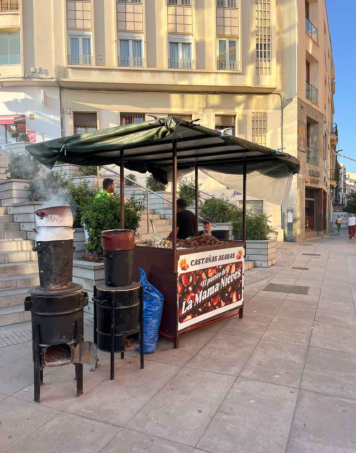 Stall with roasted chestnuts in Calle Carreteria Malaga.