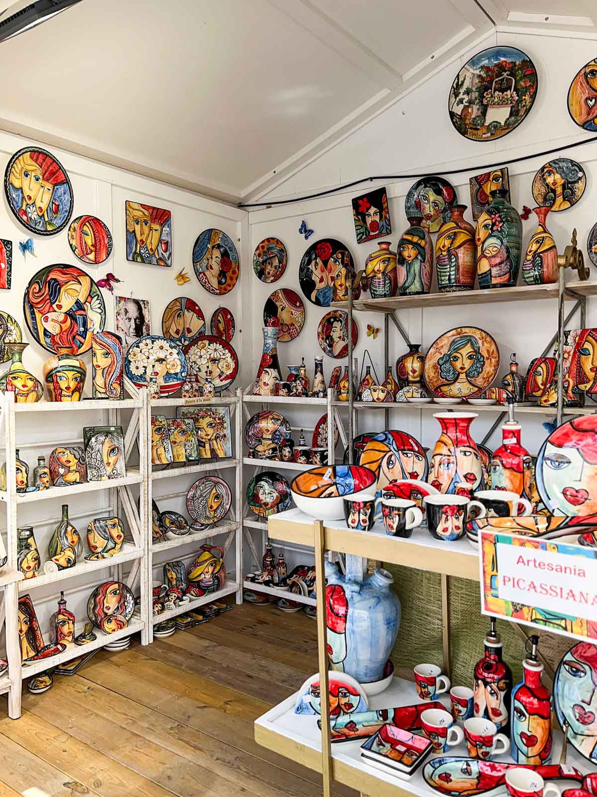 A stall with picasso-style pottery in Muelle Uno port, Malaga.