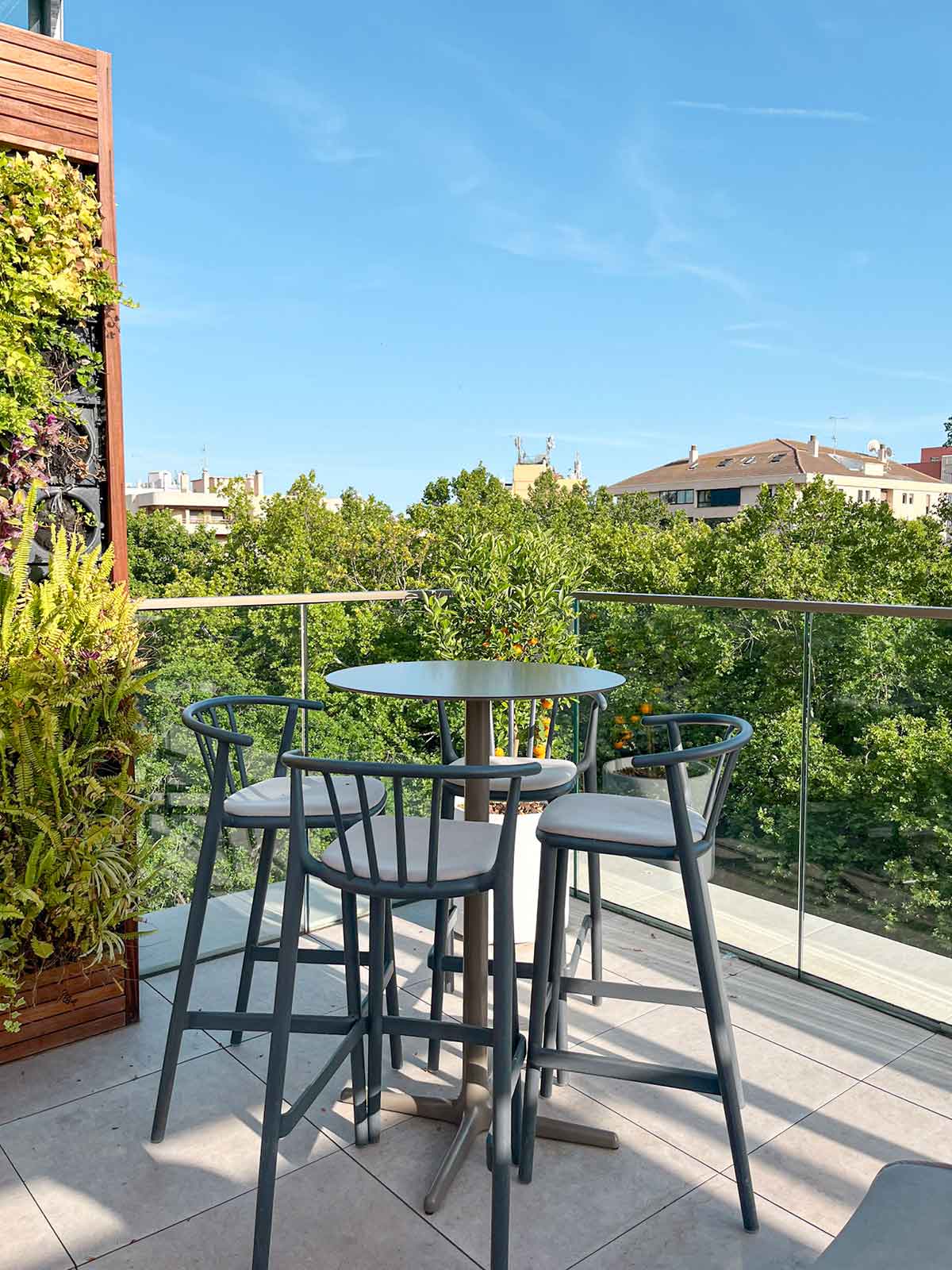 4 Best Rooftop Bars in Marbella 5 Table at 360 Blue Rooftop inside Obal Hotel in Marbella, Spain.