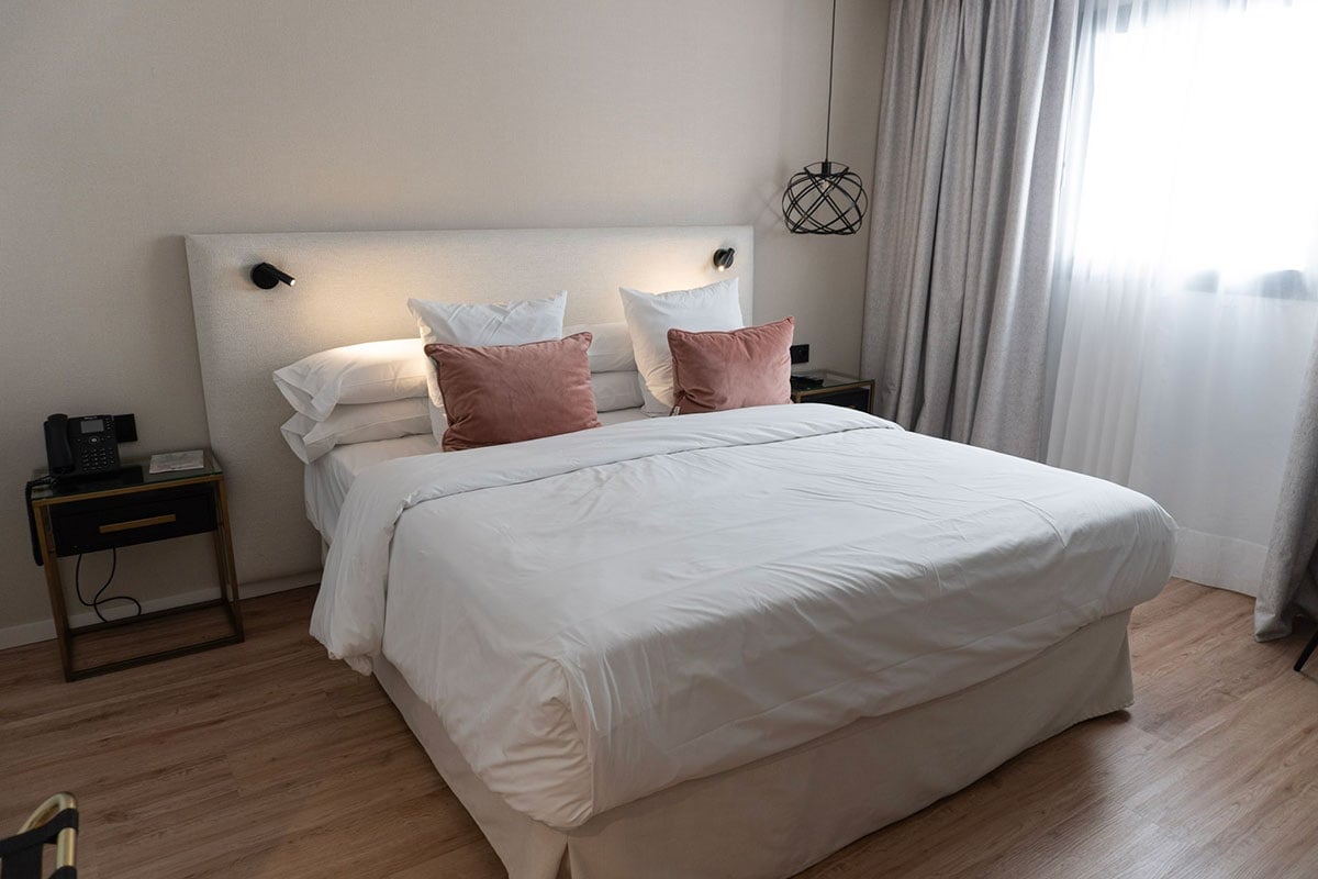 Spacious bed at a room in Obal Urban Hotel Marbella.