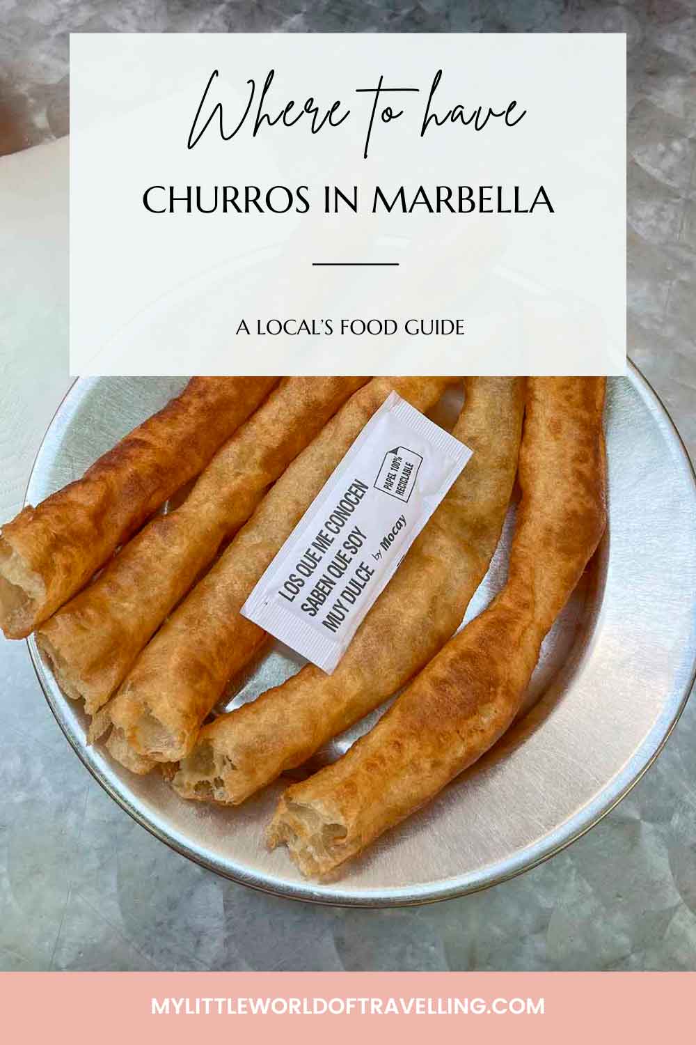 Where to Have The Best Churros in Marbella: A Local's Guide 9 Pinterest pin that shows a silver tray with churros and sugar.