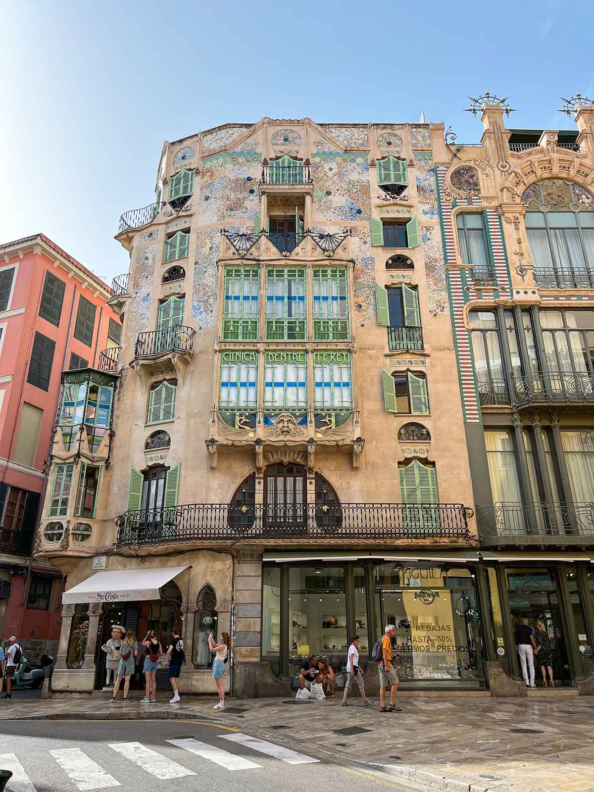 Malaga or Mallorca: My Opinion on Which Place is Better 19 A gaudi-style building with blue and green details in the centre of Palma, Mallorca.