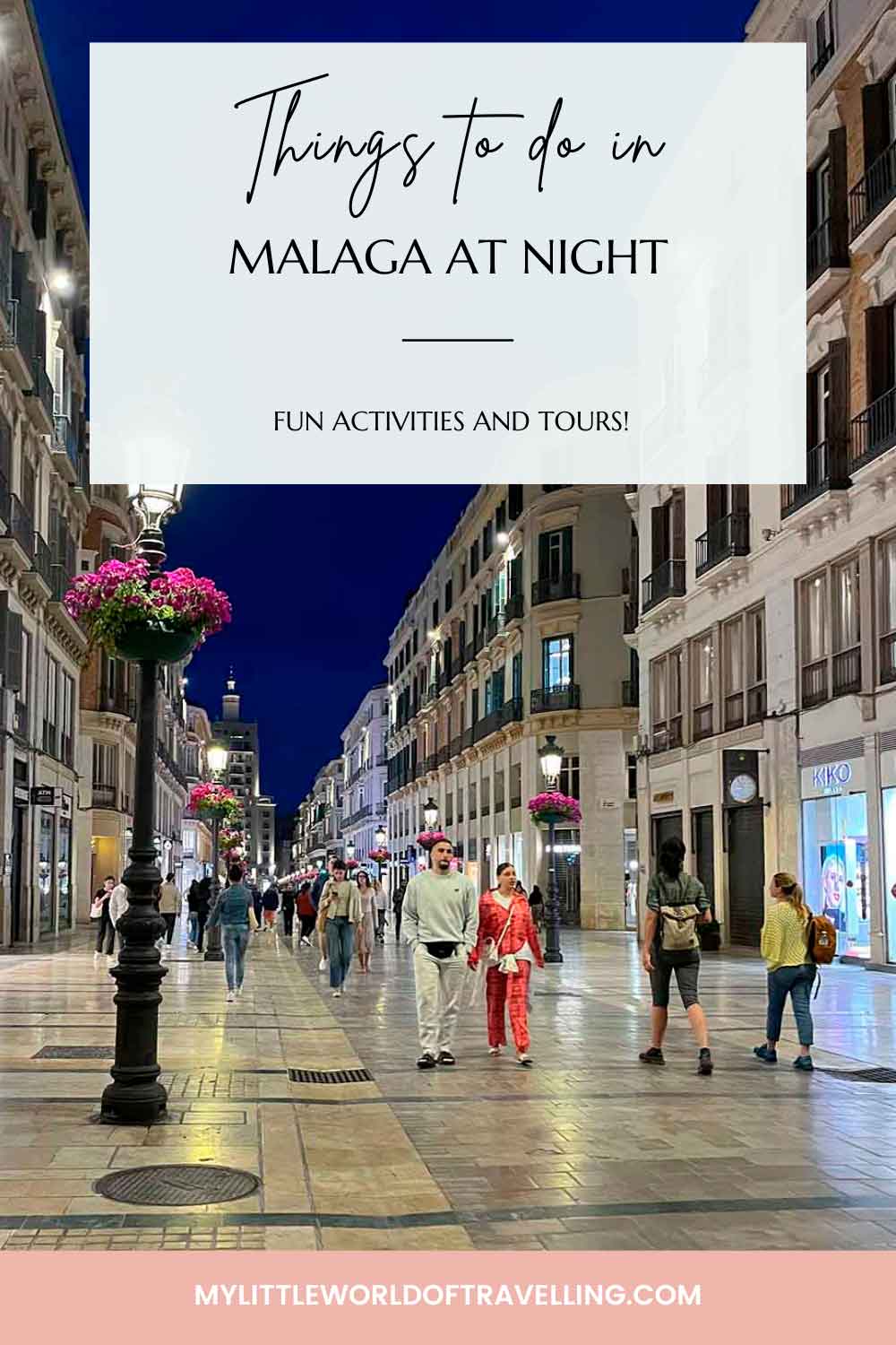 Pinterest pin that shows a photo of Calle Larios at night.