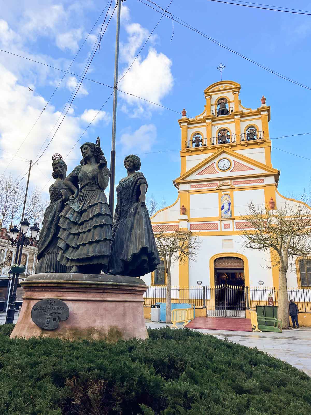 A photo of La Inmaculada Church with statues.