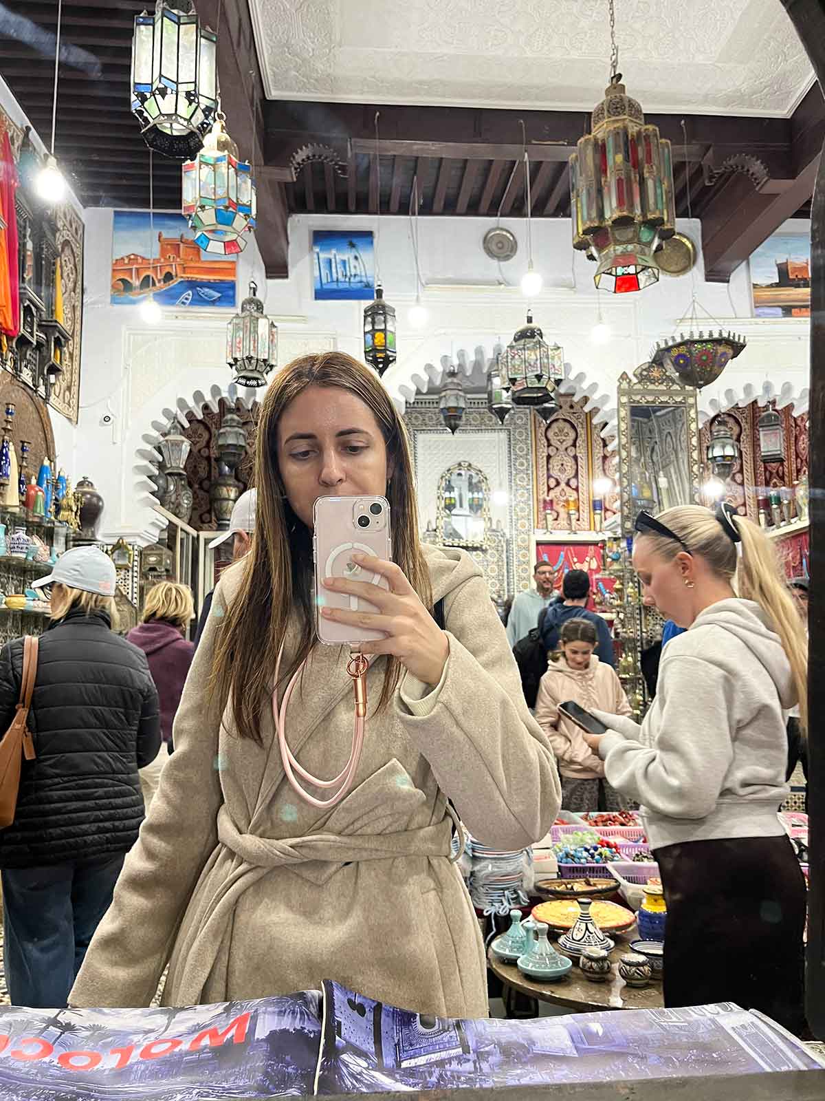 Cristina taking a selfie in a souvenir shop in Tetouan, north Morocco.