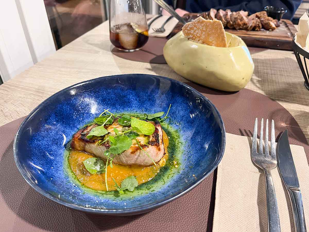 Swordfish with a tomato sauce.