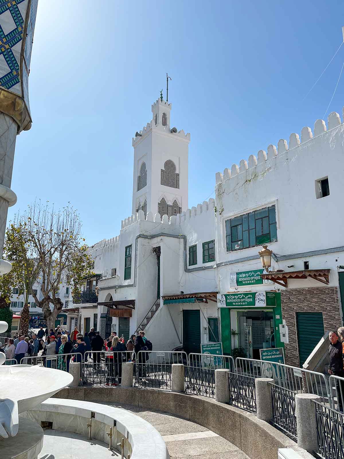 A white building with a Moorish style tower in Tetouan.
