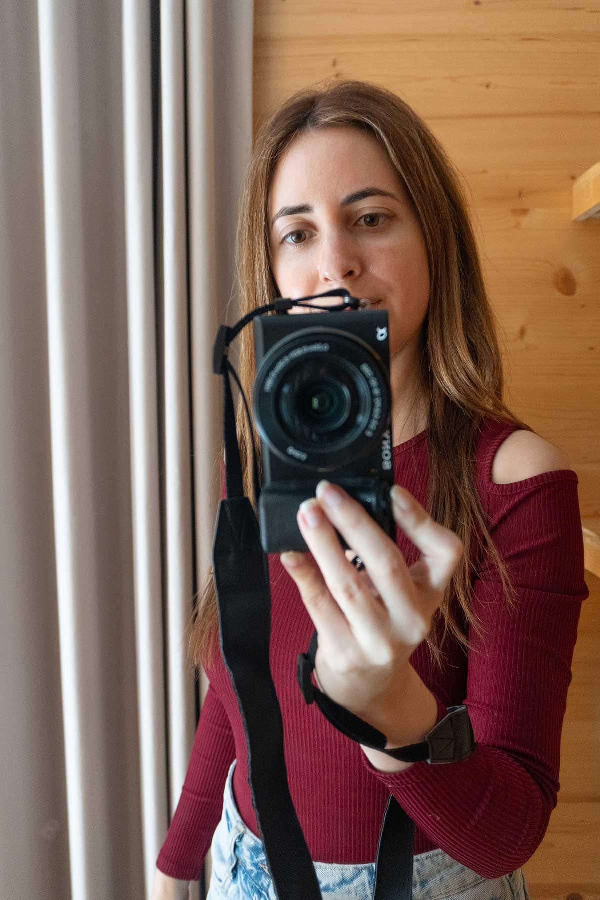 My Review Of Boat Haus, The Floating Hotel in Cadiz 3 Cristina taking a photo in the modern boat from Boat Haus Hotel.