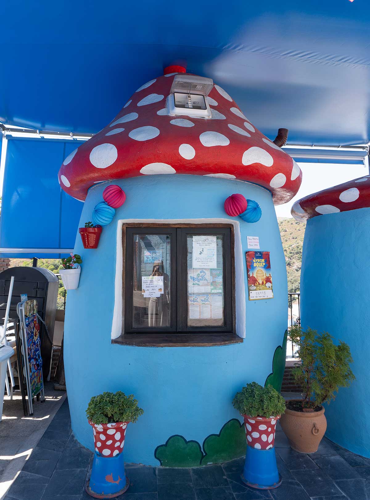Things to Do in Juzcar, The Blue Village in Malaga 12 Mushroom shaped kiosk in Juzcar.