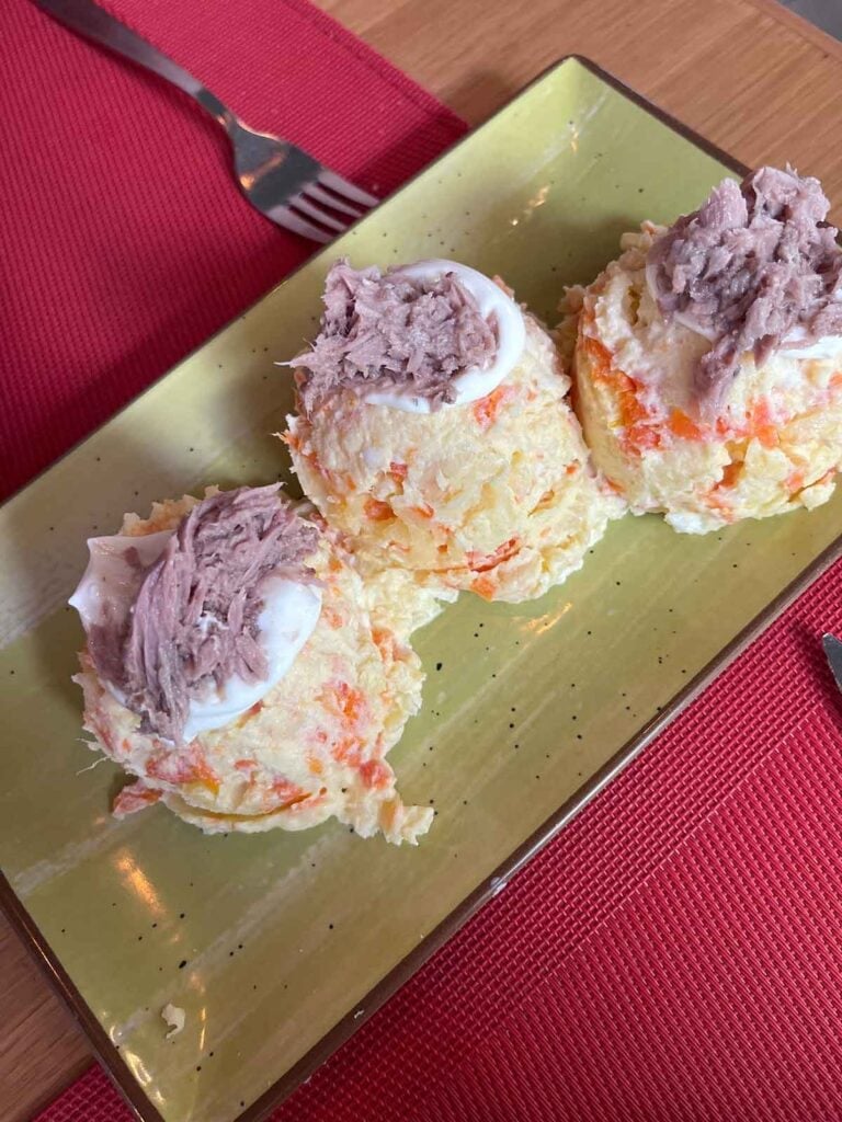 Ultimate Guide to Gluten-Free Seville 12 Potato and carrot salad with tuna and mayonnaise at Postigo 10 restaurant in Seville.