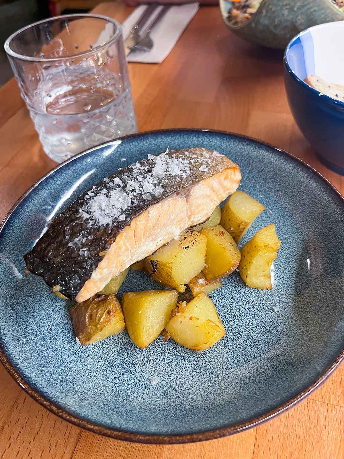 Ultimate Guide to Gluten-Free Seville 9 Salmon with roasted potatoes at Señora Pan restaurant in Seville city centre.